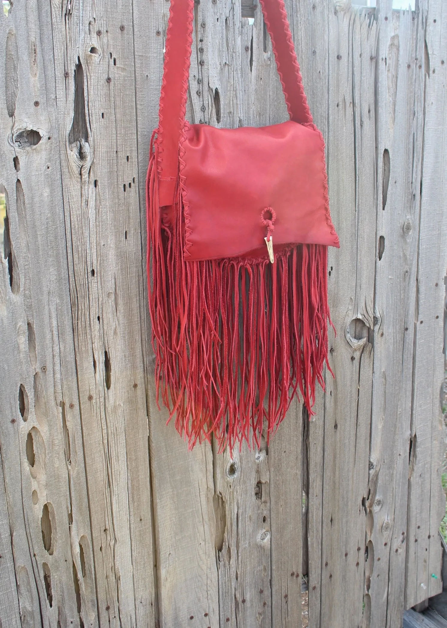 Fringed red leather handbag, soft leather bag